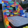 A climbing wall made of foam building blocks